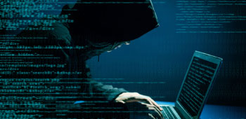 hacker in dark clothing working to obtain your information